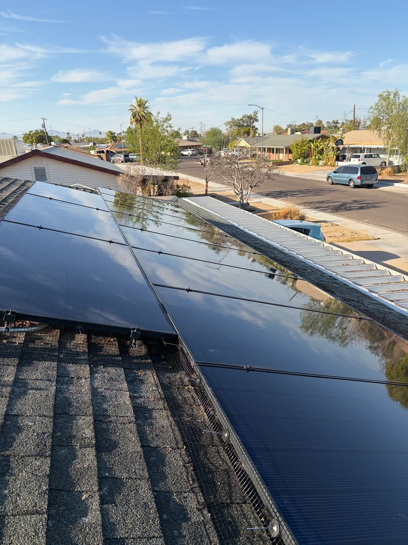 Reflective rooftop solar panels from a recent cleaning project
